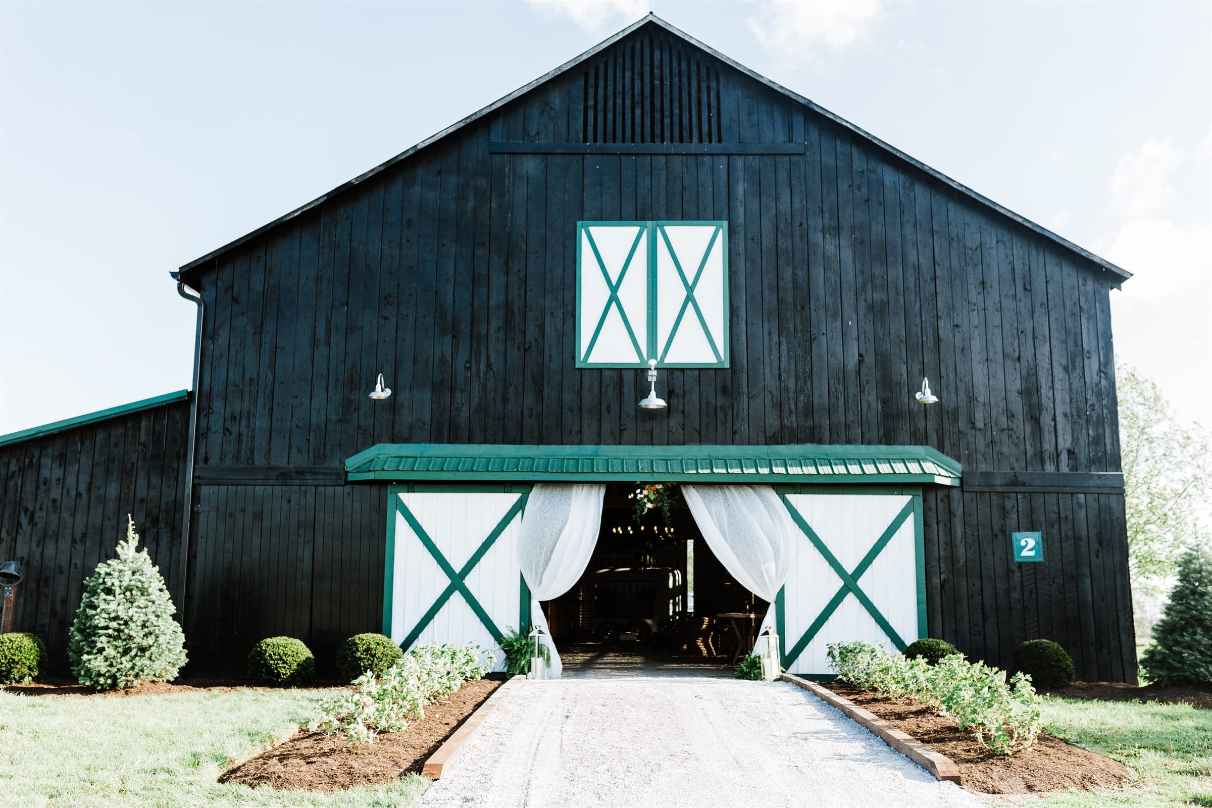 The black barn dressed for an evening event